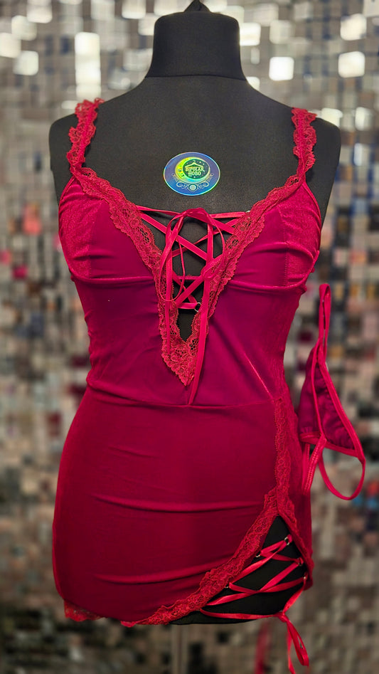 Red lingerie set on a mannequin with a blurred background